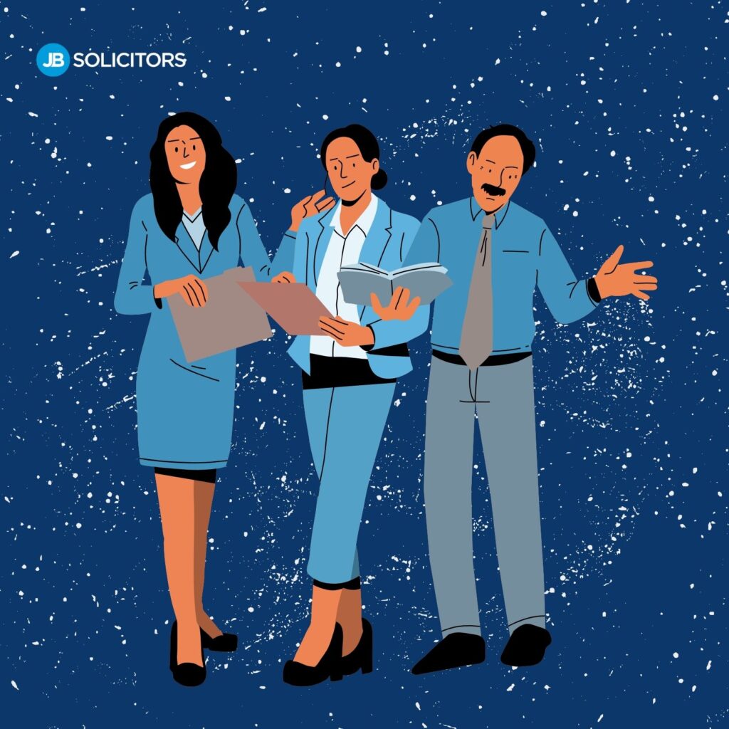 Three professionals in smart attire.