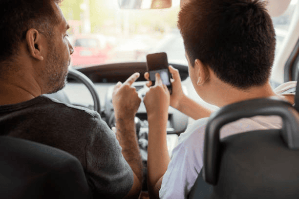 can a front seat passenger use a mobile phone