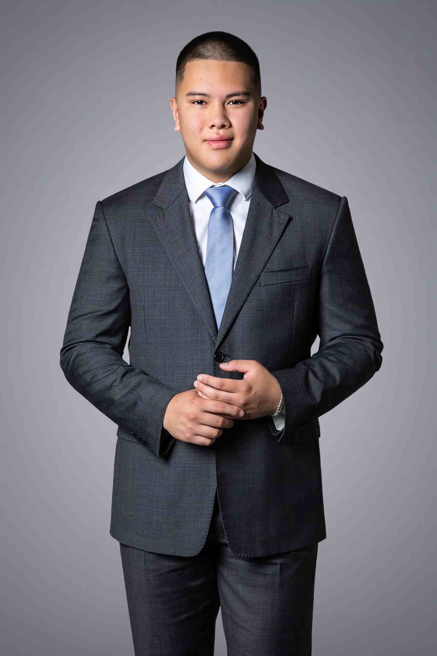 Man in formal suit and tie.